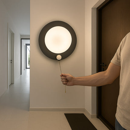 Applique moderno tondo 10W nero e oro con tecnologia CCT enzoled