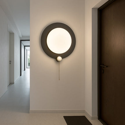 Applique moderno tondo 10W nero e oro con tecnologia CCT enzoled