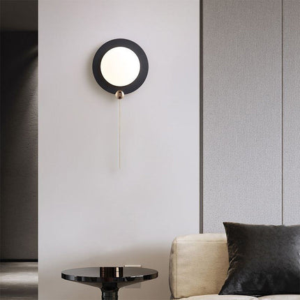 Applique moderno tondo 10W nero e oro con tecnologia CCT enzoled