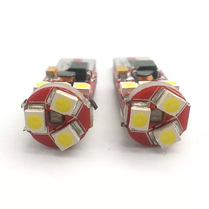 Luci di posizione a led 9 led SMD 2 lampadine auto Canbus luci targa fari Luce Fredda 6000K 9 watt alimentazione 12V attacco T10 - enzoled