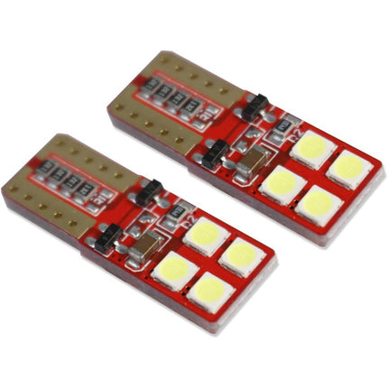 Luci di posizione a led 8 led SMD 2 lampadine auto Canbus luci targa fari Luce Fredda 6000K 8 watt alimentazione 12V attacco T10 - enzoled