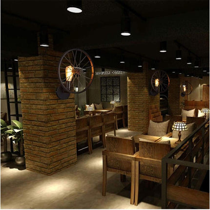 Applique a parete stile vintage lampada da muro country a forma di ruota di bicicletta nero attacco E27 - enzoled