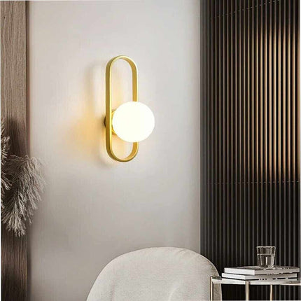 Applique da parete minimalista lampada da muro in metallo bronzo con sfera in vetro per camera da letto G9 - enzoled
