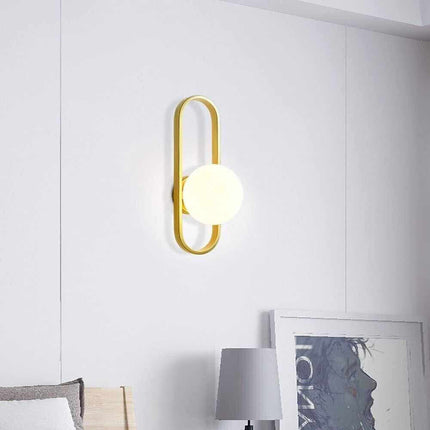 Applique da parete minimalista lampada da muro in metallo bronzo con sfera in vetro per camera da letto G9 - enzoled