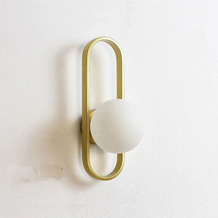 Applique da parete minimalista lampada da muro in metallo bronzo con sfera in vetro per camera da letto G9 - enzoled