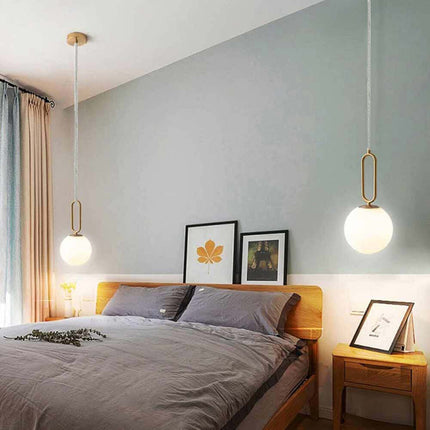Lampadario a sospensione minimalista lampada per tavolo con ovale in metallo bronzo con sfera in vetro per cucina camera da letto G9 - enzoled