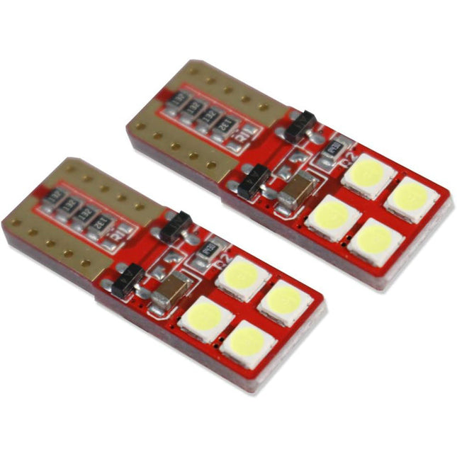 Luci di posizione a led 8 led SMD 2 lampadine auto Canbus luci targa fari Luce Fredda 6000K 8 watt alimentazione 12V attacco T10 - enzoled