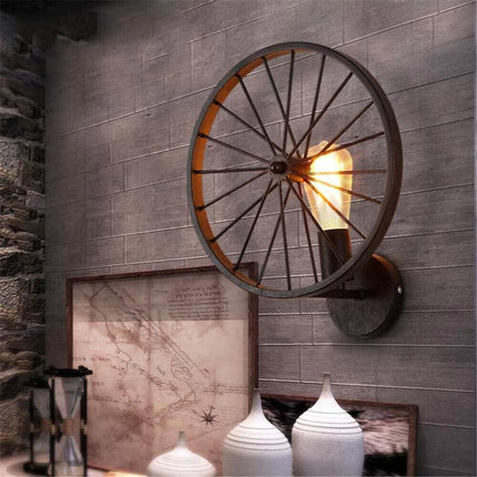 Applique a parete stile vintage lampada da muro country a forma di ruota di bicicletta nero attacco E27 - enzoled