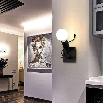 Applique da parete decorativo a forma di omino lampada da muro in metallo attacco E27 arredo casa - enzoled