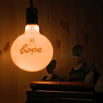 Lampadina ambrata con led a filamento che crea la scritta hope 4 watt E27 lampada decorativa stile vintage luce calda 2500k - enzoled