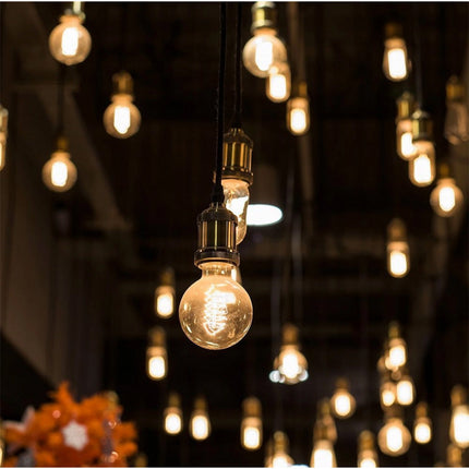 Lampadina con led spirale a filamento 4 watt attacco E27 sfera in vetro ambrato lampada vintage luce calda 2500k - enzoled