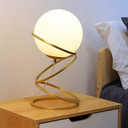 Lampada da tavolo minimalista lume in metallo bronzo con una sfera in vetro per camera da letto G9 - enzoled