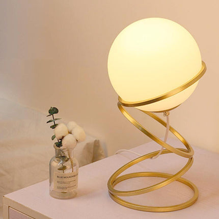Lampada da tavolo minimalista lume in metallo bronzo con una sfera in vetro per camera da letto G9 - enzoled